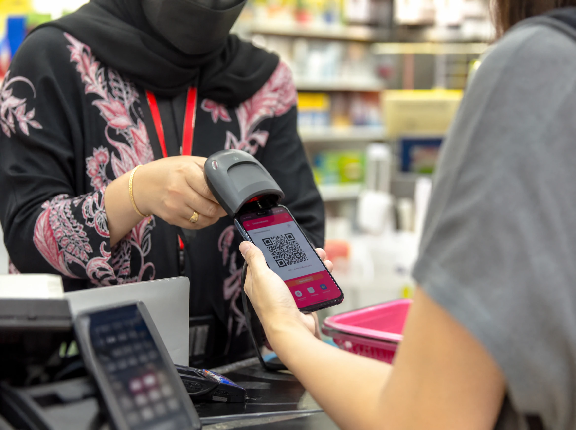 Customer scanning a loyalty rewards QR code in a shopping app