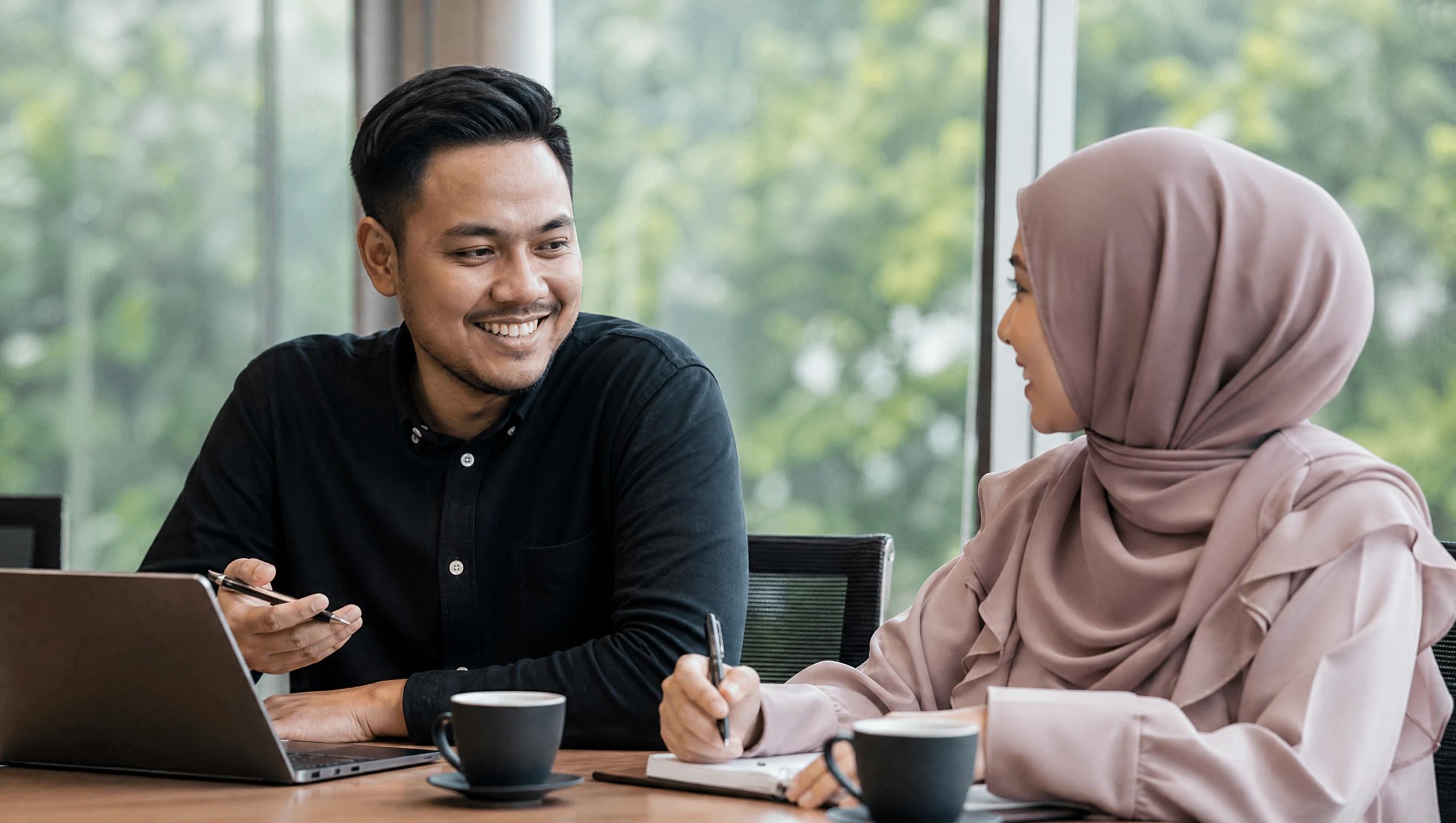 Friendly project consultation between a Malaysian team and a client